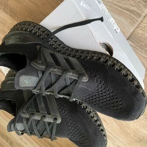 Addidas black running shoes.